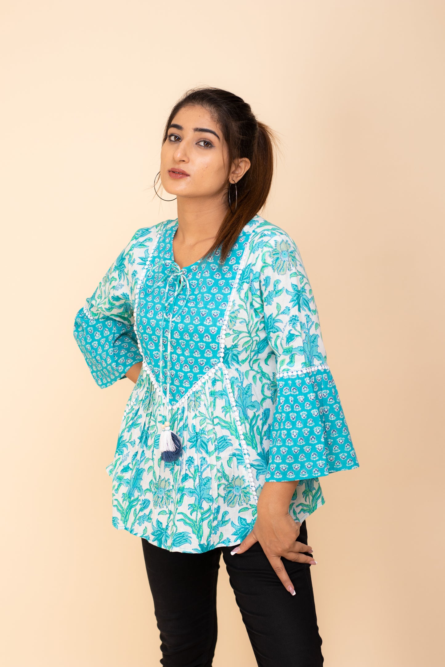 Elegant Aqua blue Printed Peplum Cotton Top with Tassel Detailing